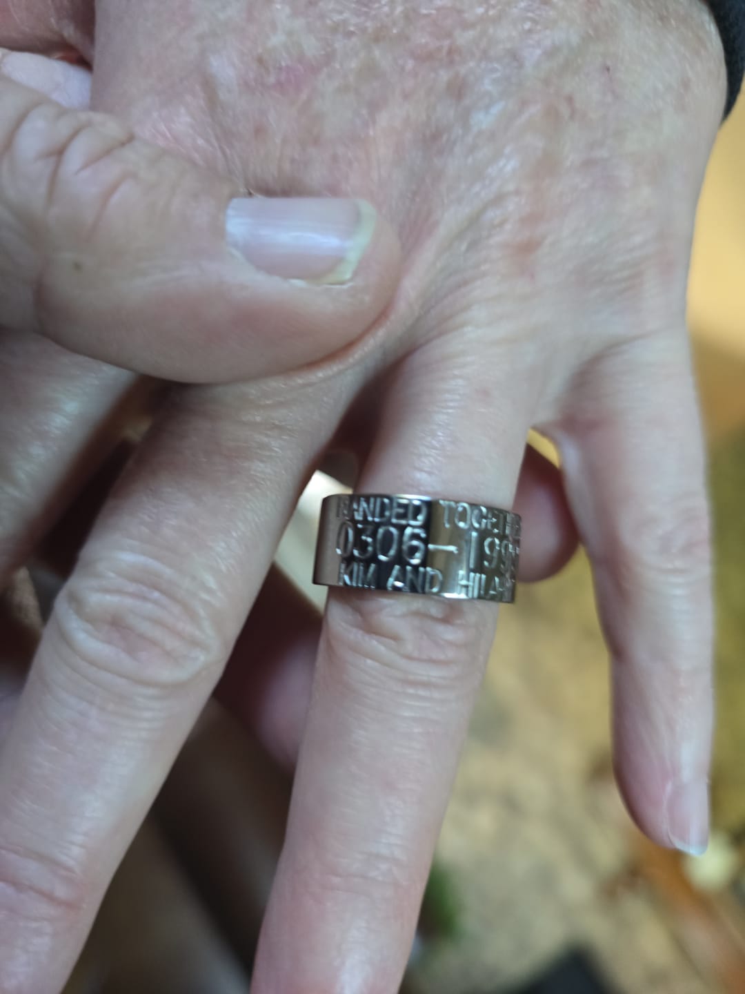Customer photo review of Duck Band Wedding Ring - 10mm Titanium