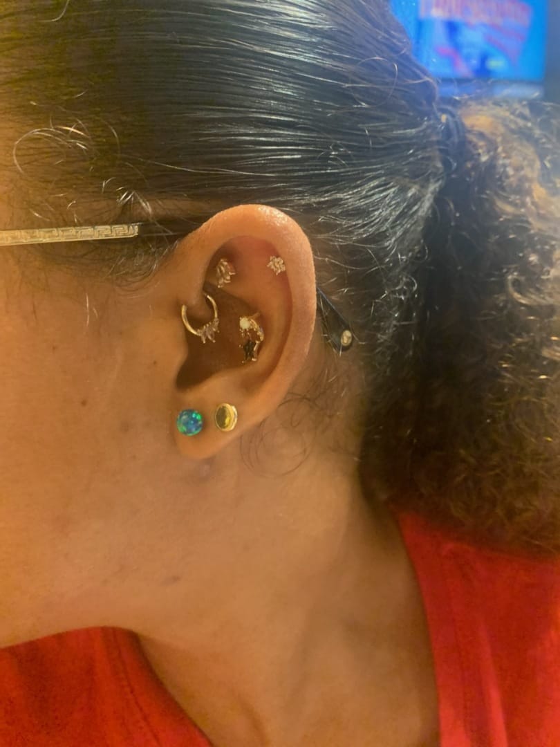 Customer photo review of 14K Gold Black Star Crescent Cartilage Earring 18G16G