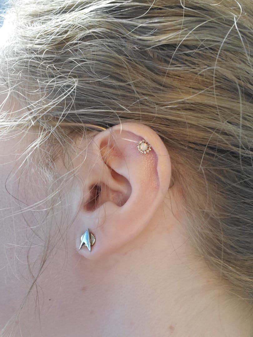 Customer photo review of 14K Gold Opal Sunflower Cartilage Earring 20G18G