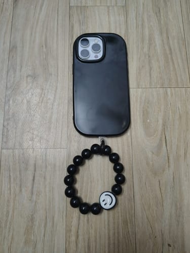 Customer photo review of Oval Shape Silicon Case With Hand Bracelet for iPhone ( Black )