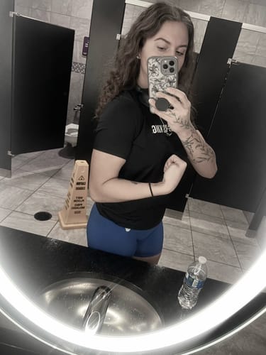 Customer photo review of Women's Jesus Is King Performance Tee