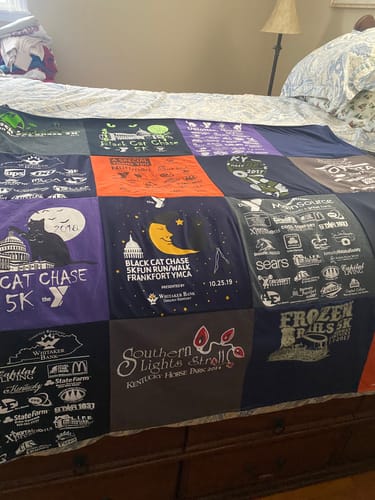 T-shirt quilt with running, community events themes by Debbie from KY
