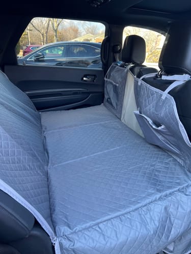 Customer photo review of NEW Waterproof Hard Bottom Car & Truck Seat Foldable Hammock Cover With Storage Pockets, Side Flaps, Headrest Straps, Seat Anchors, & Mesh Window (+FREE SAFETY BELT!)