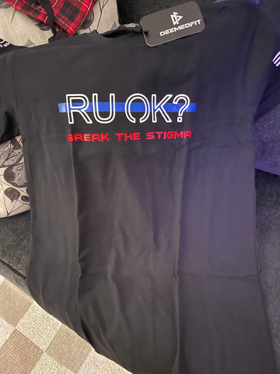 Customer photo review of Stigma-Breaking Unisex Tee