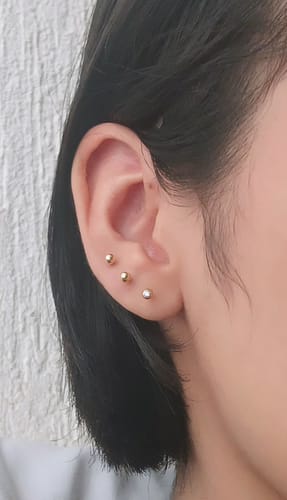 Customer photo review of Piercing 1era Perforación Bolita Titanio