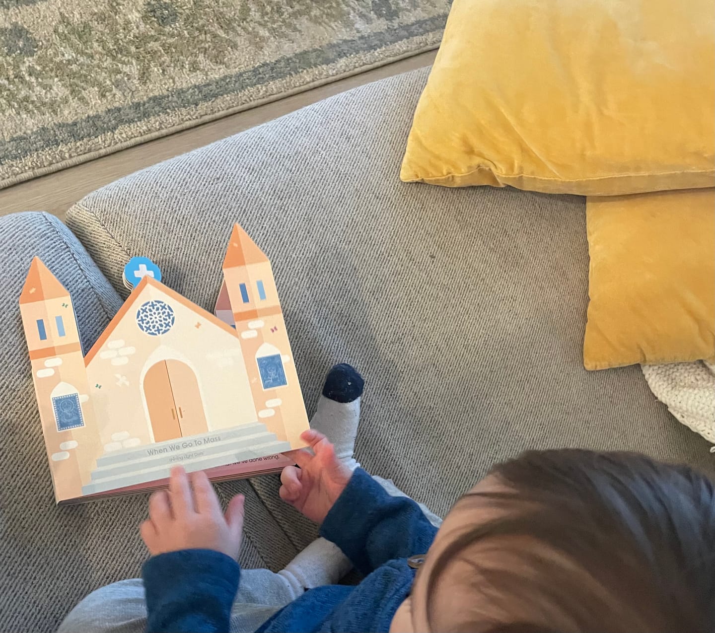 Customer photo review of When We Go to Mass - shaped board book