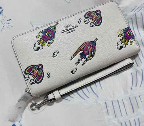 Customer photo review of Coach Women's Cosmic Coach Long Zip Around Wallet With Rocket Print Novelty Leather/Silver/Chalk Multi