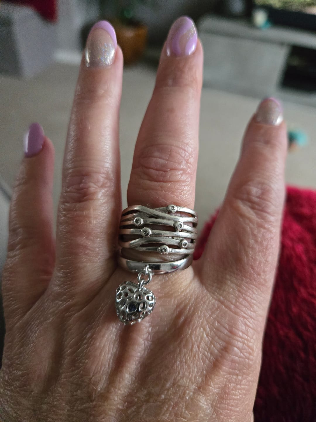 Customer photo review of Angel Heart Charm Ring with Tanzanite
