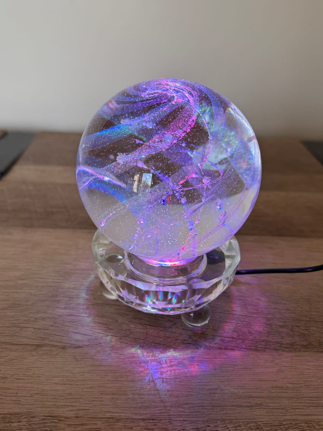 Customer photo review of Illuminated Dichroic Rainbow Orb with Cremains