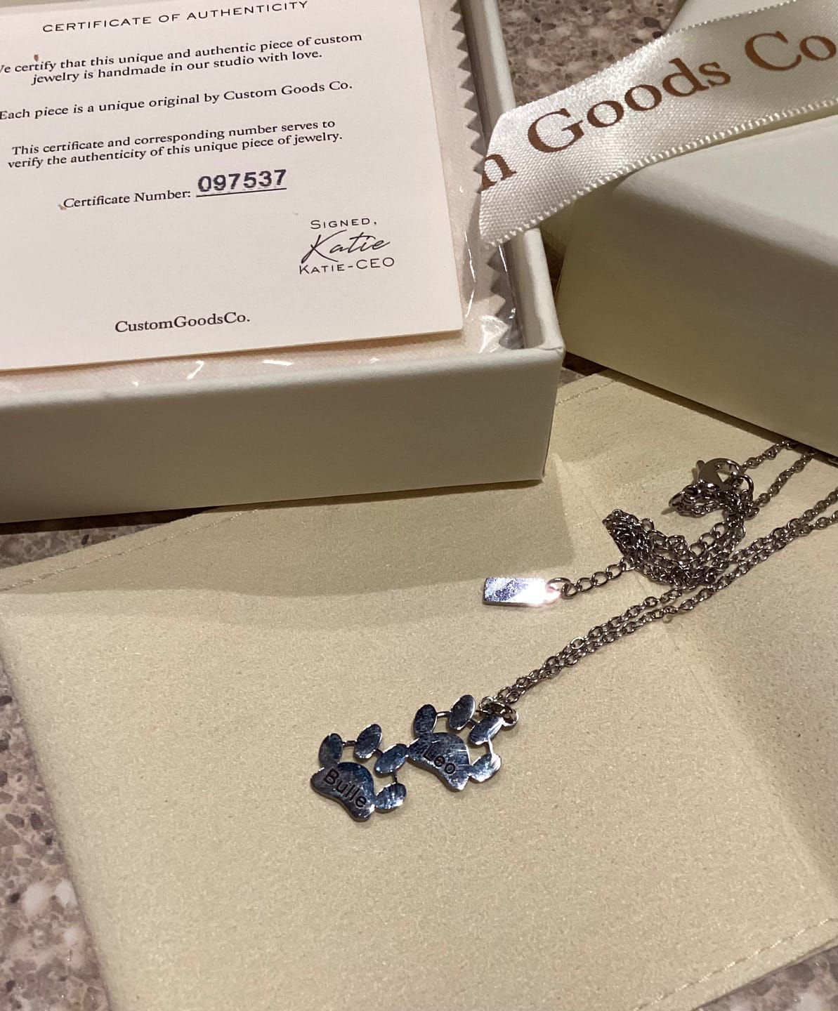 Customer photo review of Personalized Paw Print Name Necklace