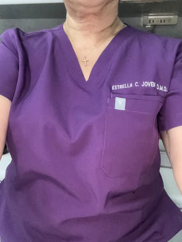 Customer photo review of Zip-Up Polo MoveTech® Scrub Top - Women / Saffron