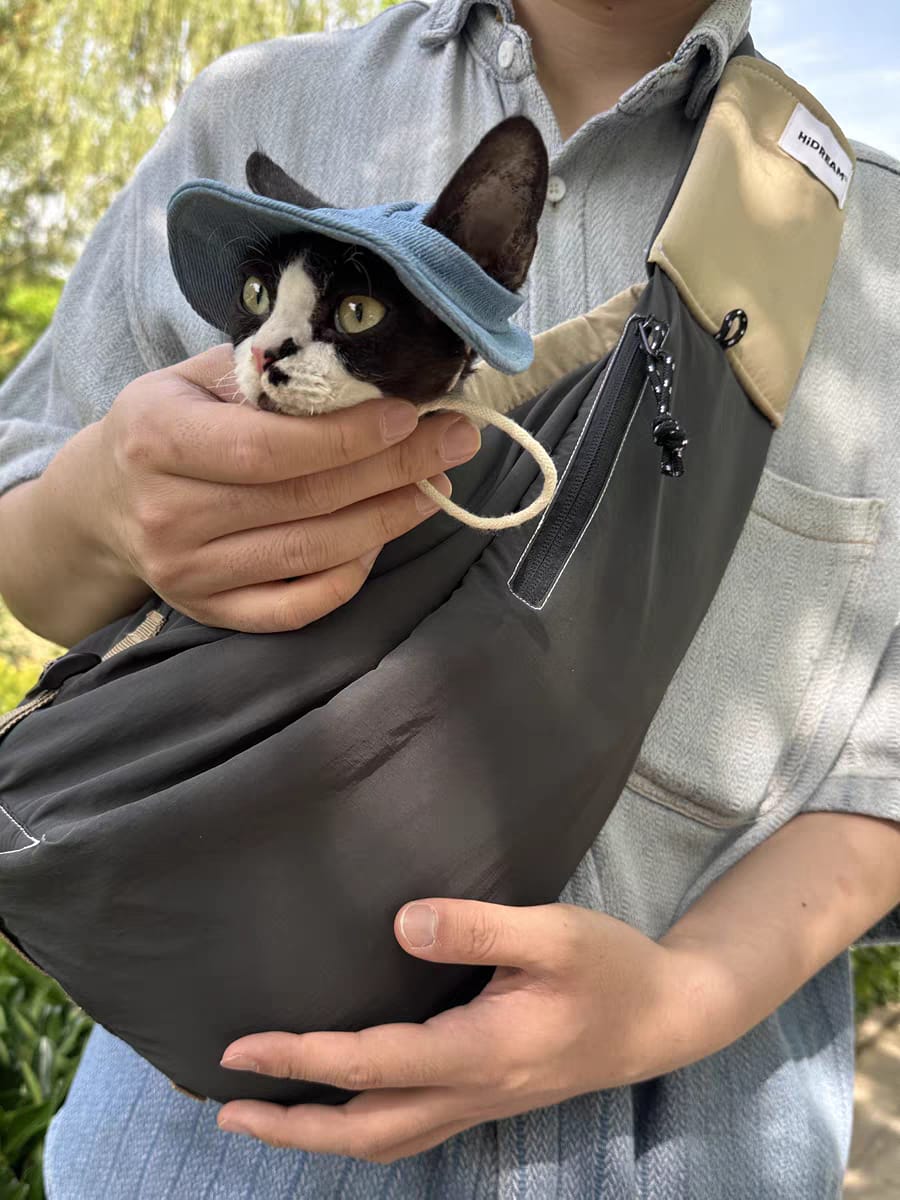 Customer photo review of Wide-Strap Cradle-Style Structured Pet Sling Carrier Bag