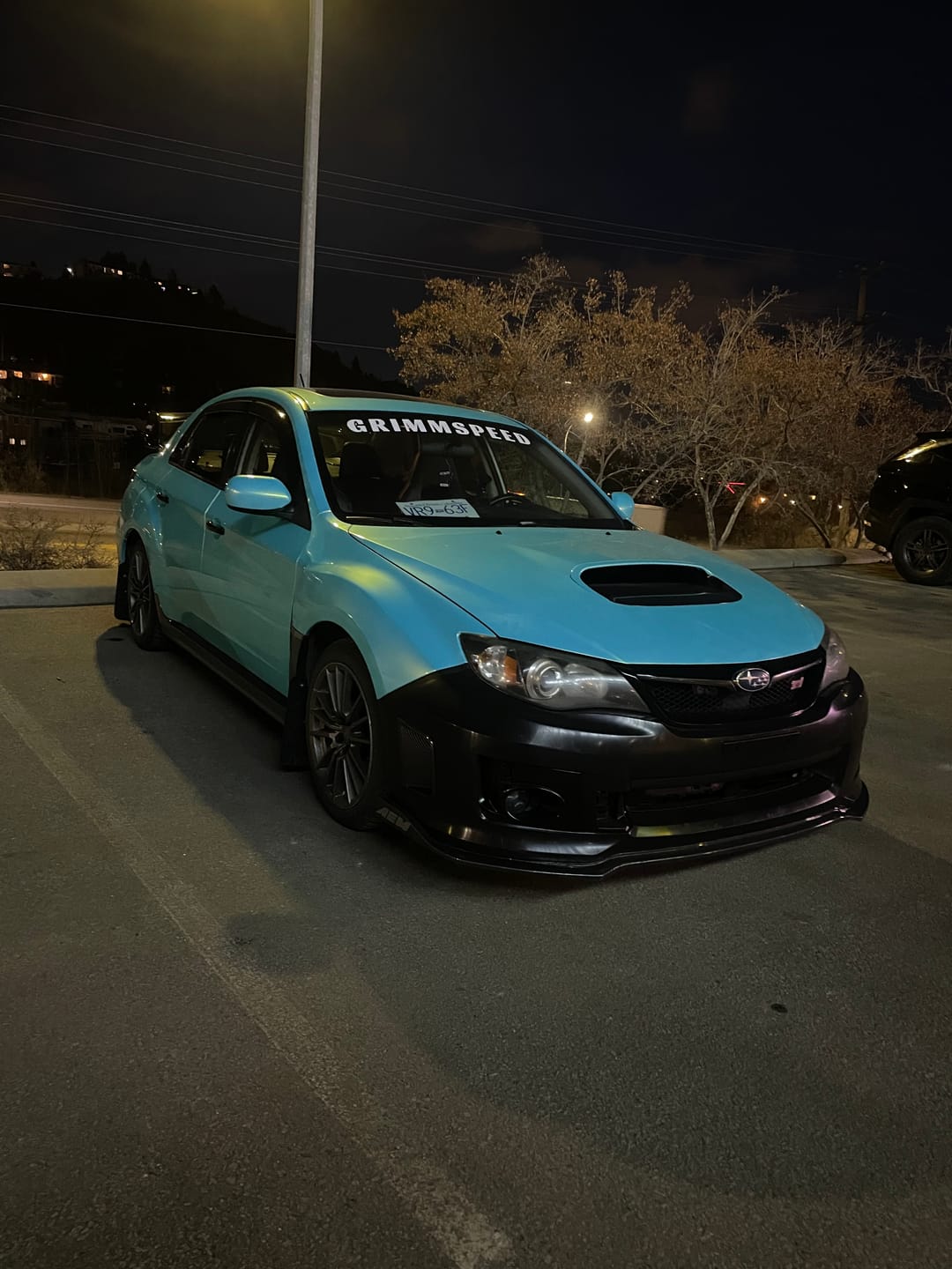 Customer photo review of Candy Metallic Neon Ice Blue Vinyl Wrap
