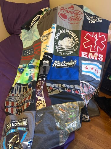 T-shirt quilt with sports, hiking themes by Keren from IL