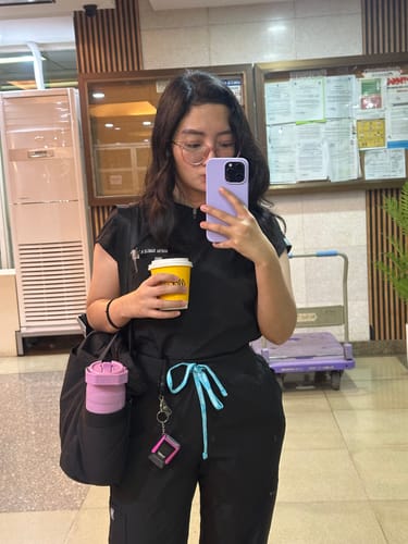 Customer photo review of Zip-Up Polo MoveTech® Scrub Top - Women / So Black