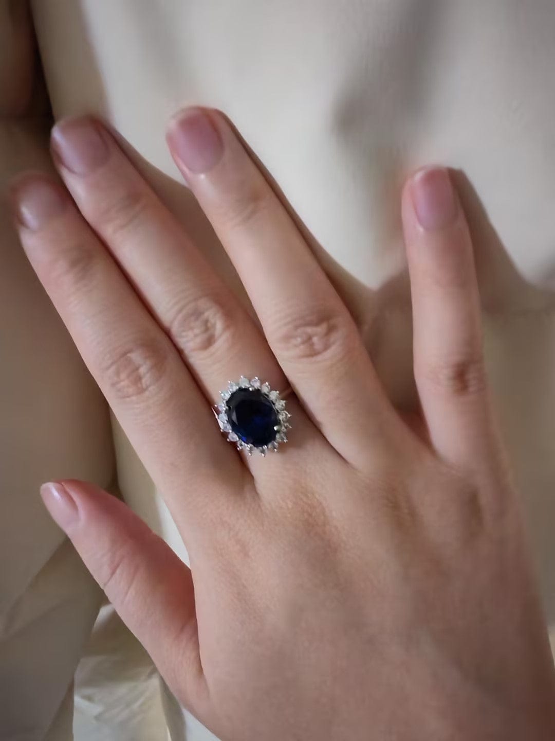 Customer photo review of 4.5 Carat Halo Oval Cut Blue/Red/Green/Yellow Sapphire Engagement Ring In Sterling Silver