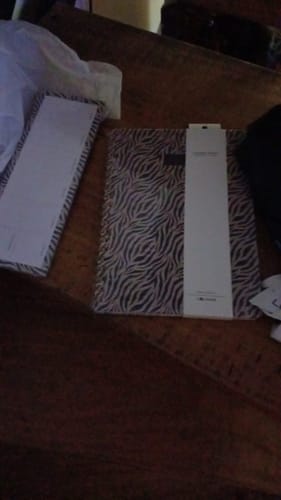 Reseña con foto de un cliente sobre Planner Semanal Cebra