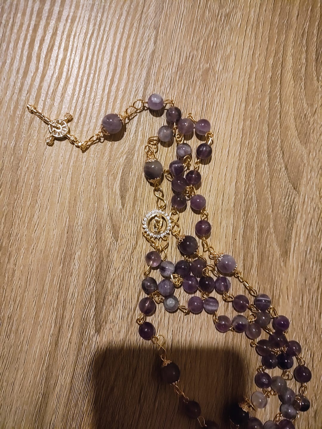 Customer photo review of Christianartworkshop Our Lady of Guadalupe & Crucifix of 8mm Round Purple Crystal Rosary