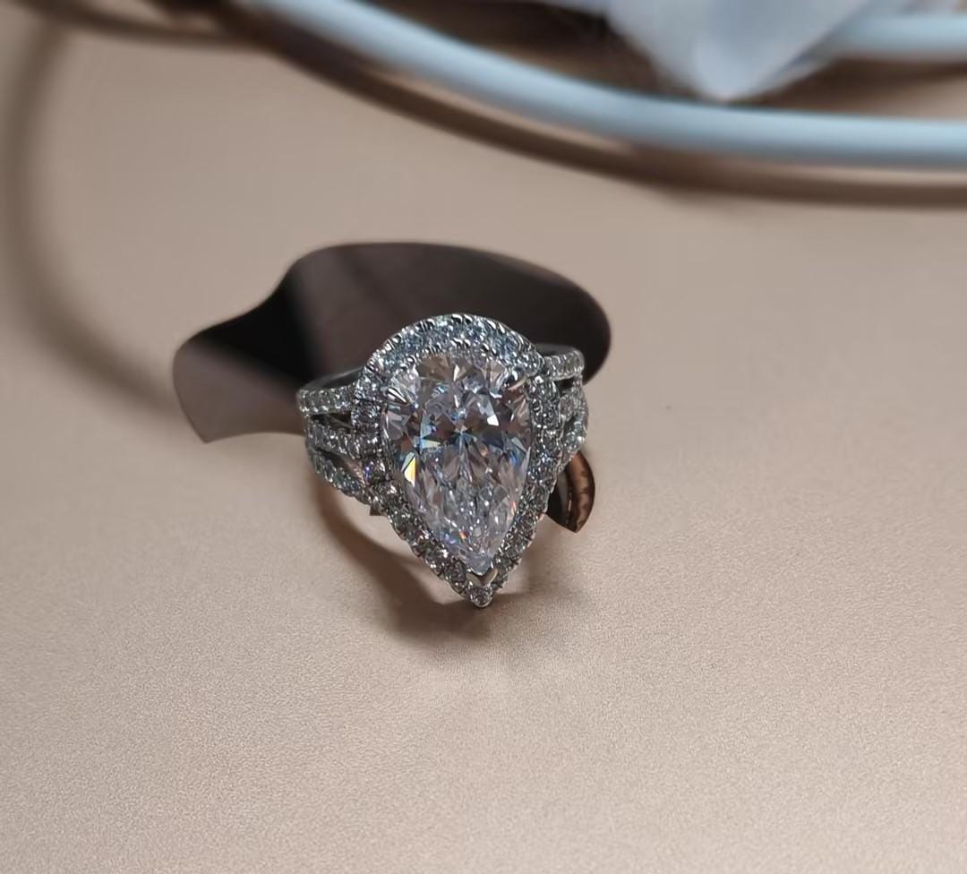 Customer photo review of Louily Vintage Split Shank Halo Pear Cut Engagement Ring In Sterling Silver