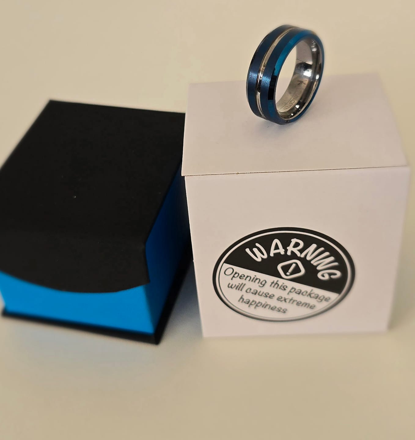 Customer photo review of 8mm - Blue & Silver Tungsten Carbide Ring - Grooved Beveled Edges - Wedding Band
