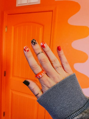 Customer photo review of Groovy Pink Orange Wavey Ring