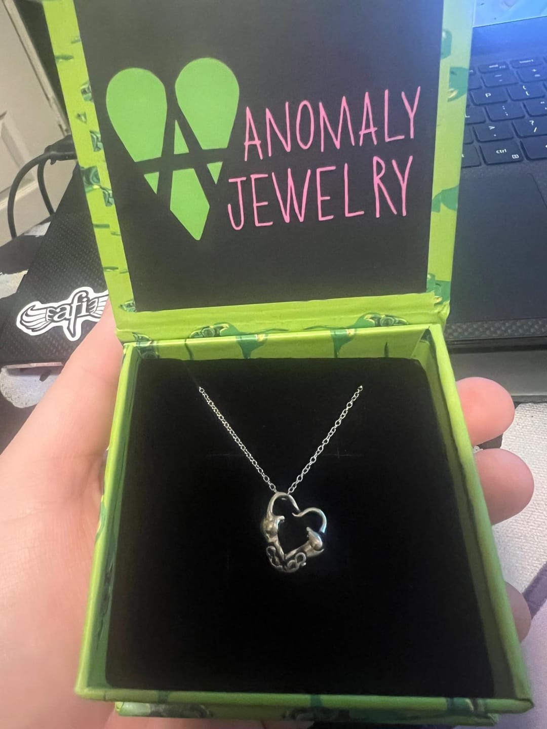 Customer photo review of Rats in Love Heart Necklace
