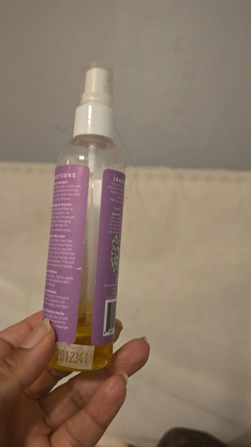 Customer photo review of Hair Growth Serum for Curly Hair with Organic Jojoba Oil for Moisturizing and Lavender Fragrance