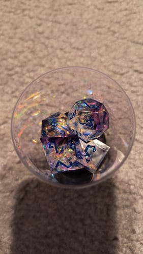 Customer photo review of Conjure Elemental Sharp-Edged Resin Dice Set