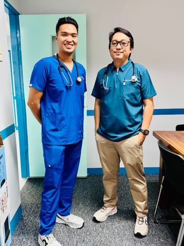 Customer photo review of 4-Pocket MoveTech® Scrub Top - Men / Cobalt Blue