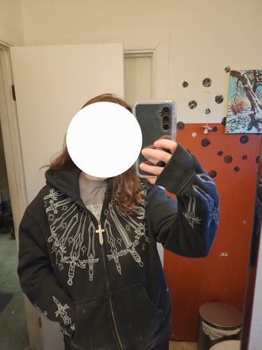 Customer photo review of 10 Billion Swords Hoodie