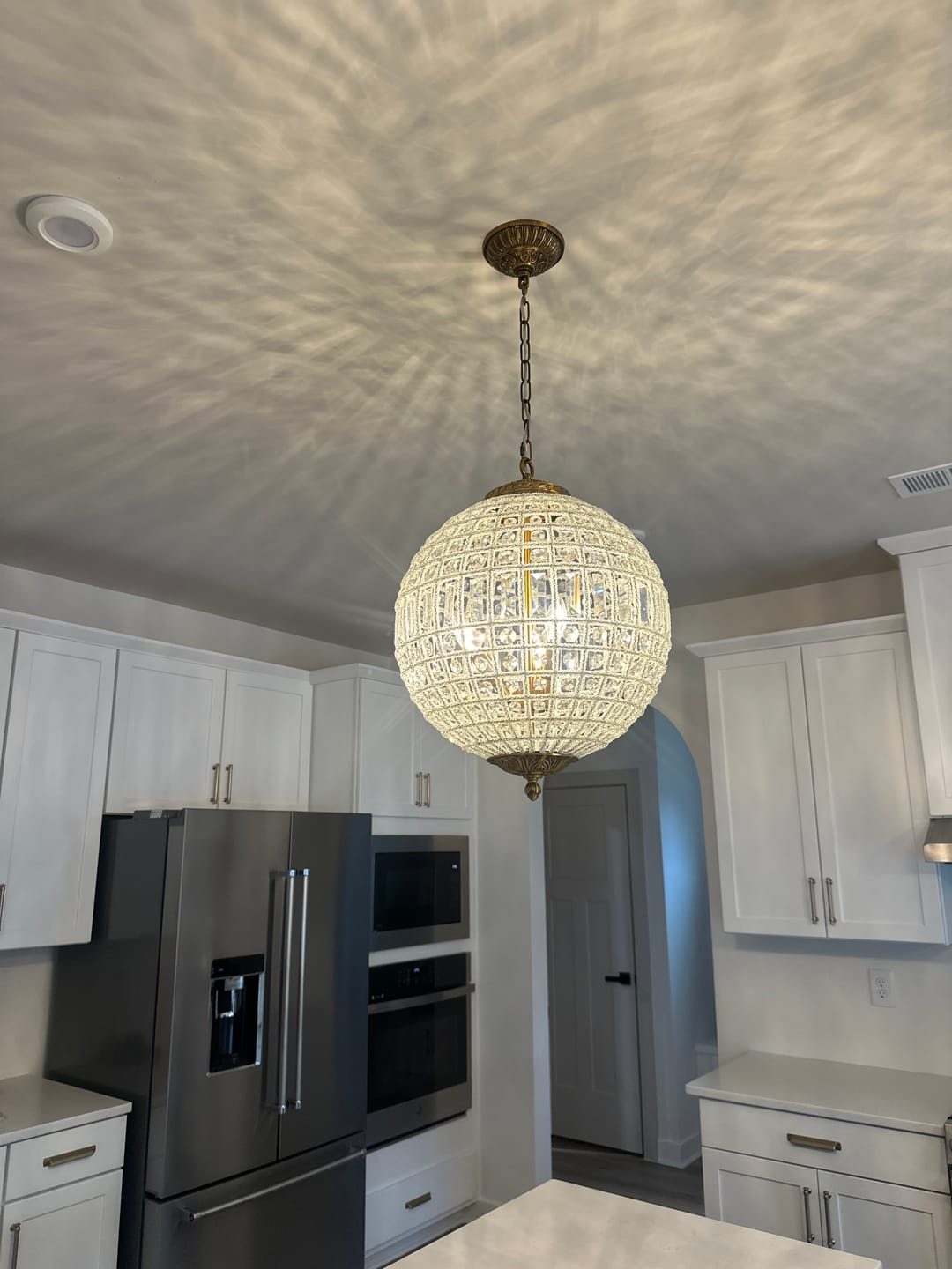 Customer photo review of French Antique Brass Crystal Globe Chandelier