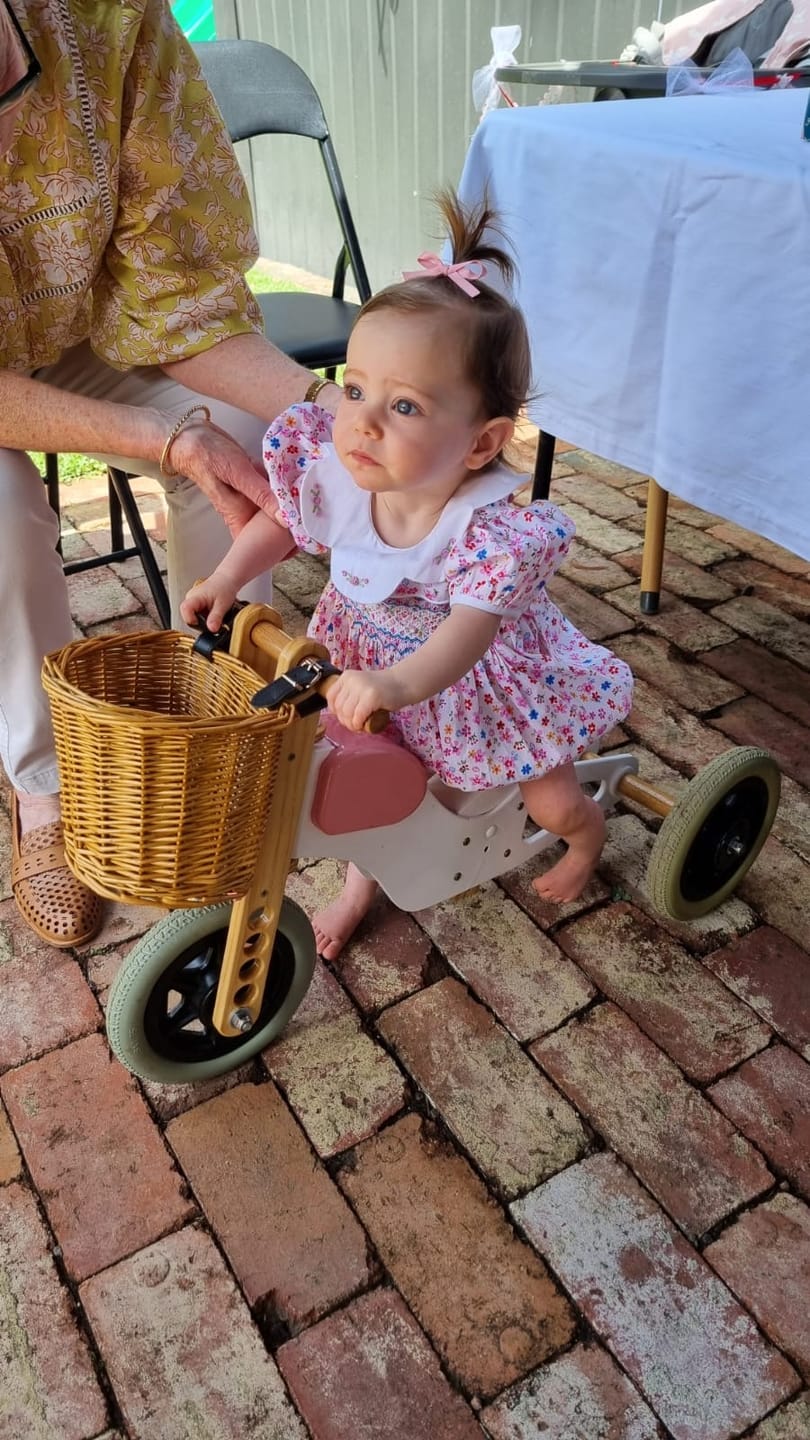 Customer photo review of Pink Petal Hand-Smocked Romper