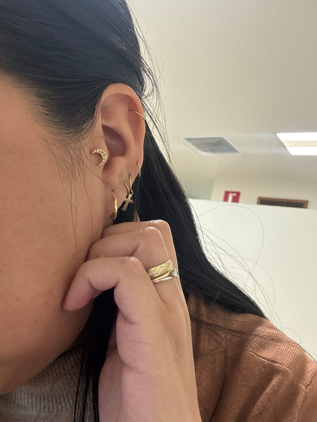Customer photo review of Acero Quirúrgico Dorado Con Zirconias Primera Perforación