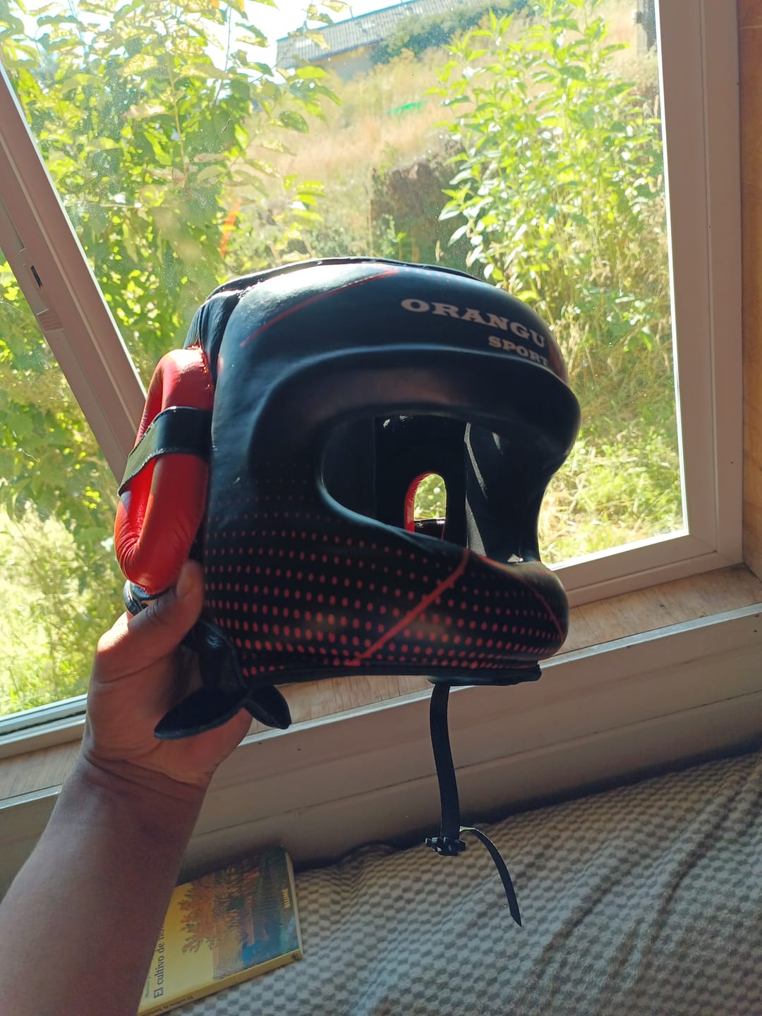 Customer photo review of CABEZAL PROTECTOR ORANGU SPORT / BOXEO