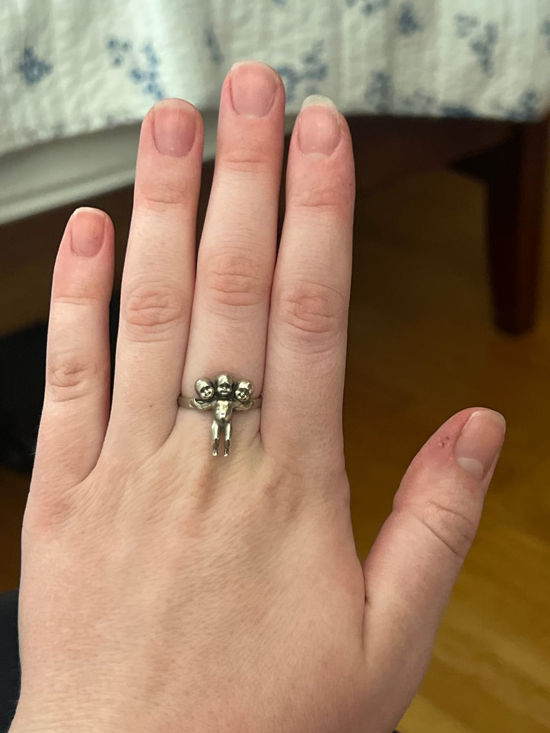 Customer photo review of Three Headed Baby Ring