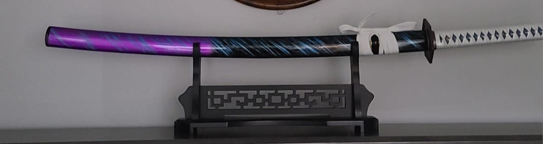 Customer photo review of The Giyuu Tomioka Handmade Katana Clay Tempered T10 Steel From Demon Slayer
