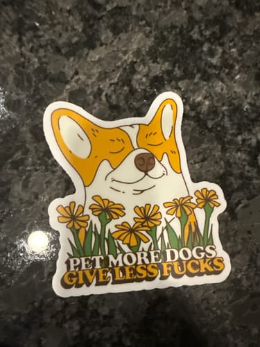Customer photo review of "Pet More Dogs. Give Less Fu**s" Sticker