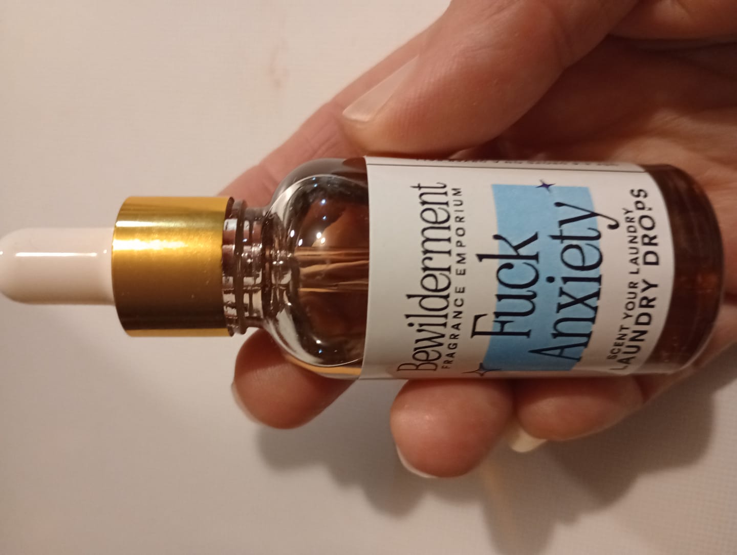 Customer photo review of Fuck Anxiety Laundry Drops