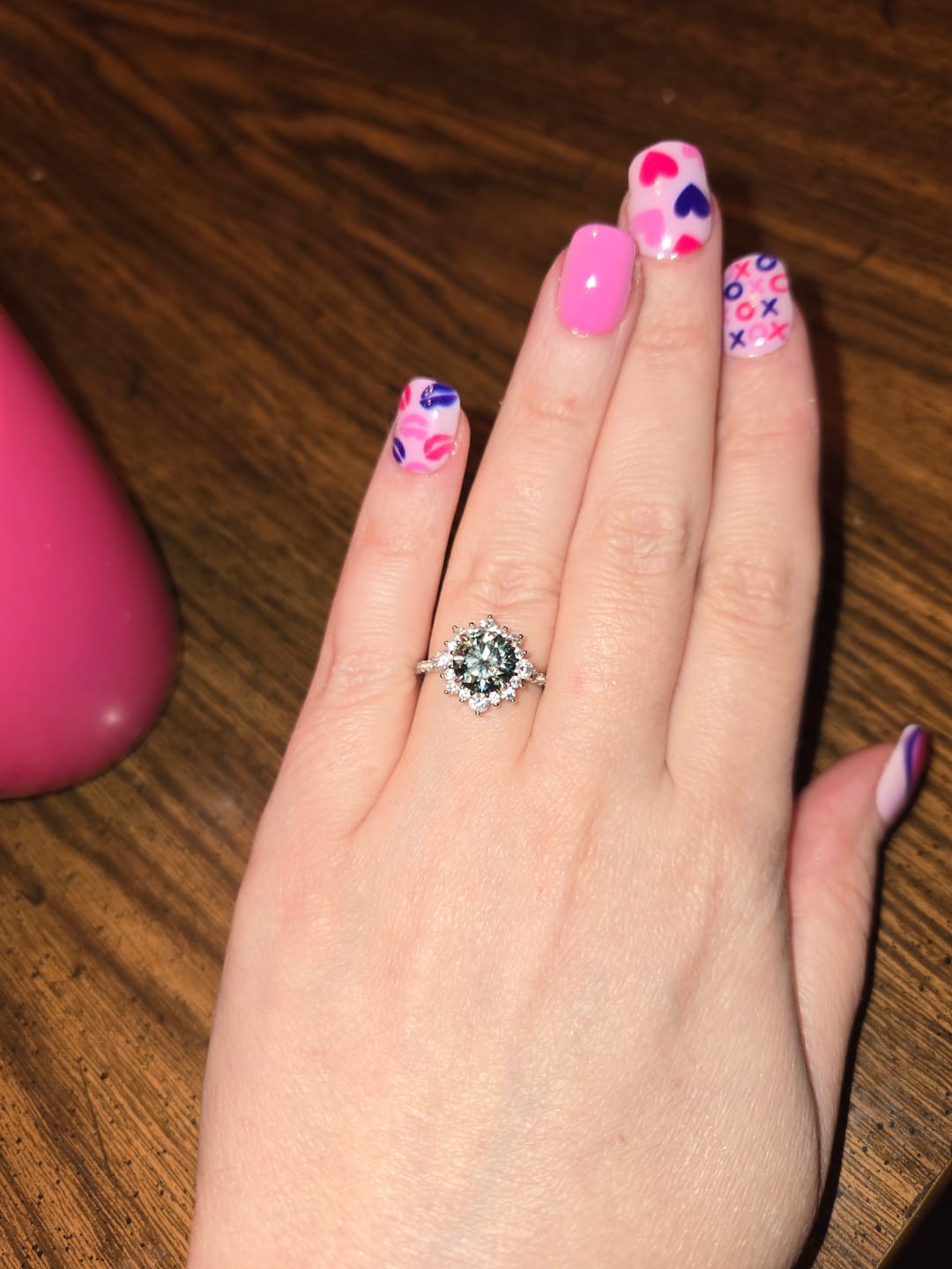 Customer photo review of S925 Moissanite 2 Ct Snowflake Design Halo Round Cyan Blue Stone Engagement Ring