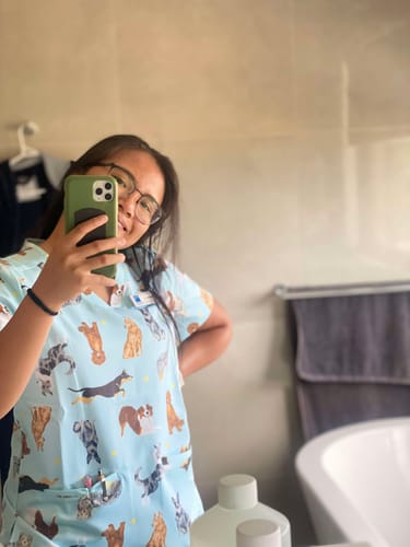 Customer photo review of Down Under Dogs Women’s 3-Pocket Scrub Top