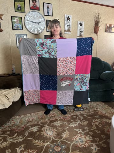 T-shirt quilt with quilting themes by Heather from IN