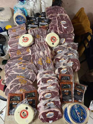 Reseña con foto de un cliente sobre Asado de Tira