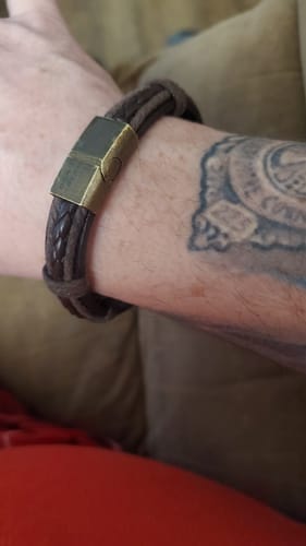 Customer photo review of Don't Tread On Me Leather Bracelet: Helps Pair Veterans With A Service Dog or Shelter Dog