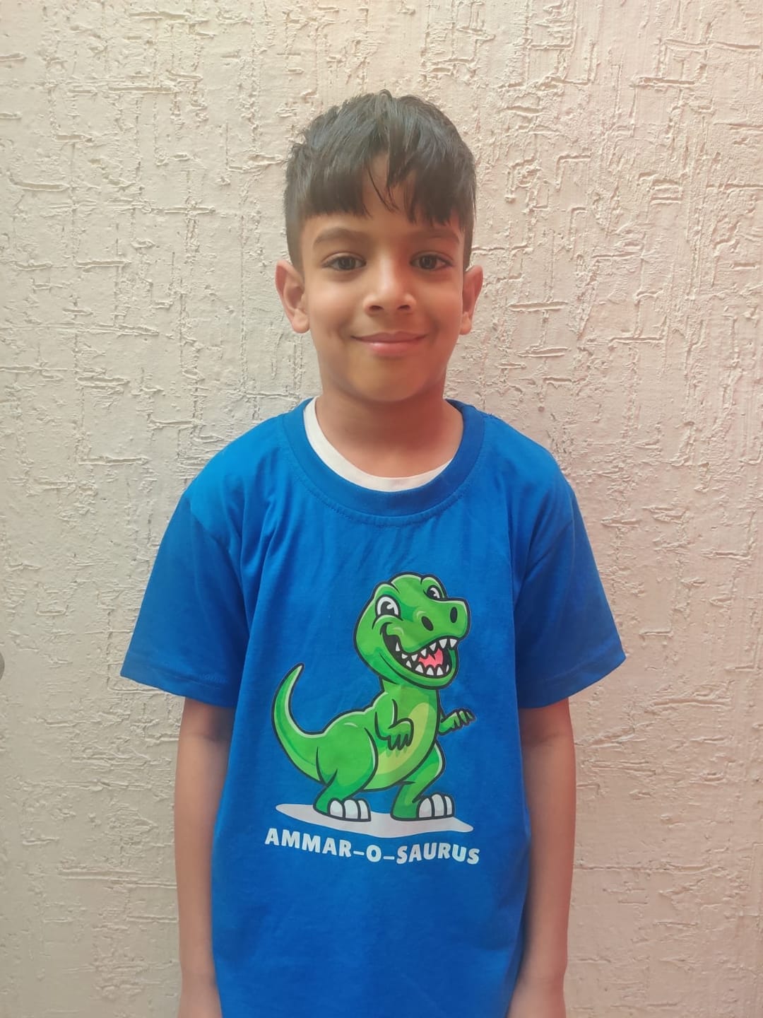 Customer photo review of Dino-O-Saurus With Custom Kids Name Tee
