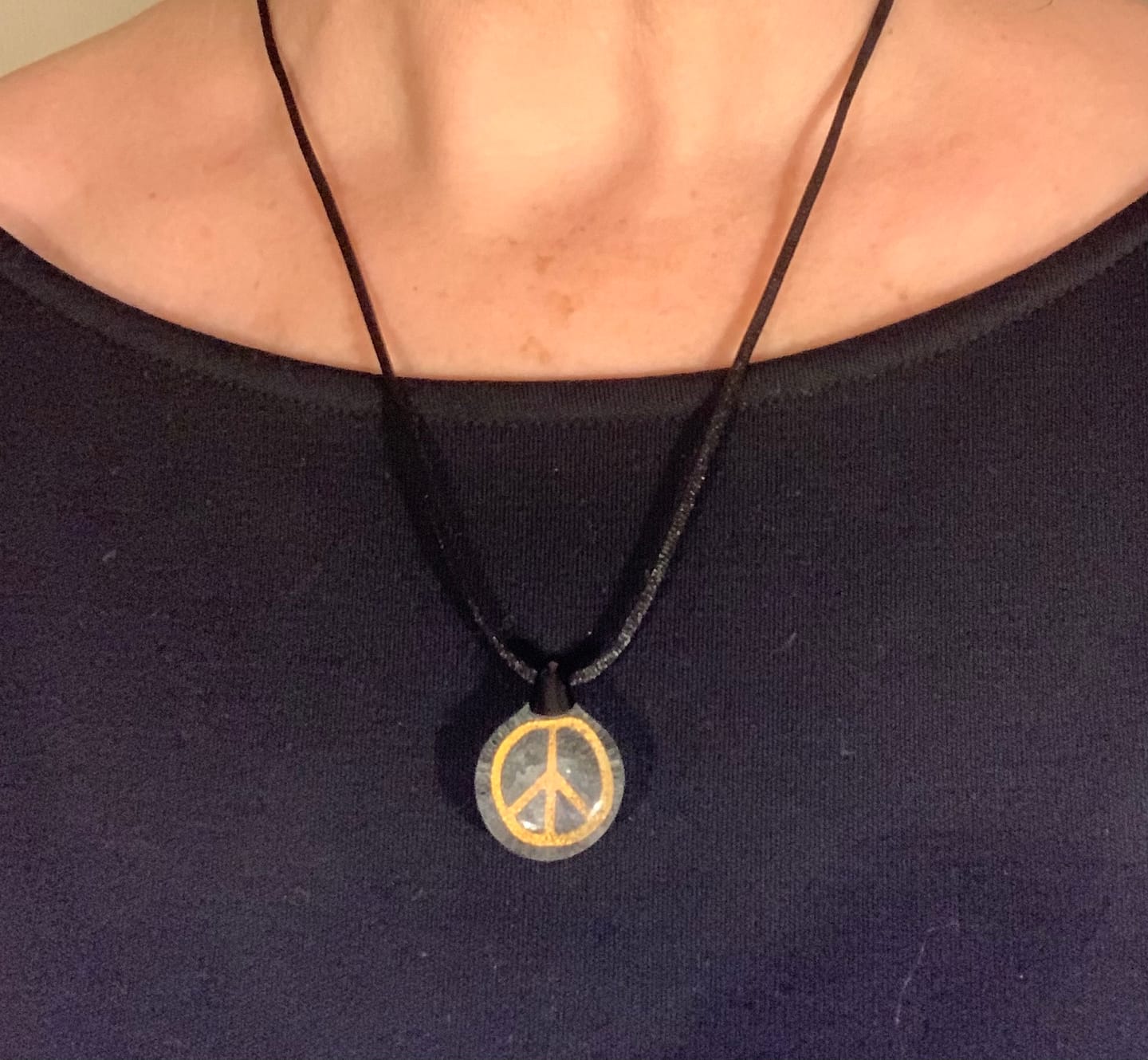 Customer photo review of Peace Sign Hologram Pendant with Infused Cremation Ash
