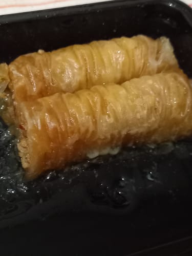 Customer photo review of Traditional Greek Saragli – Rolled Baklava with Almonds (8 pieces – 250g)