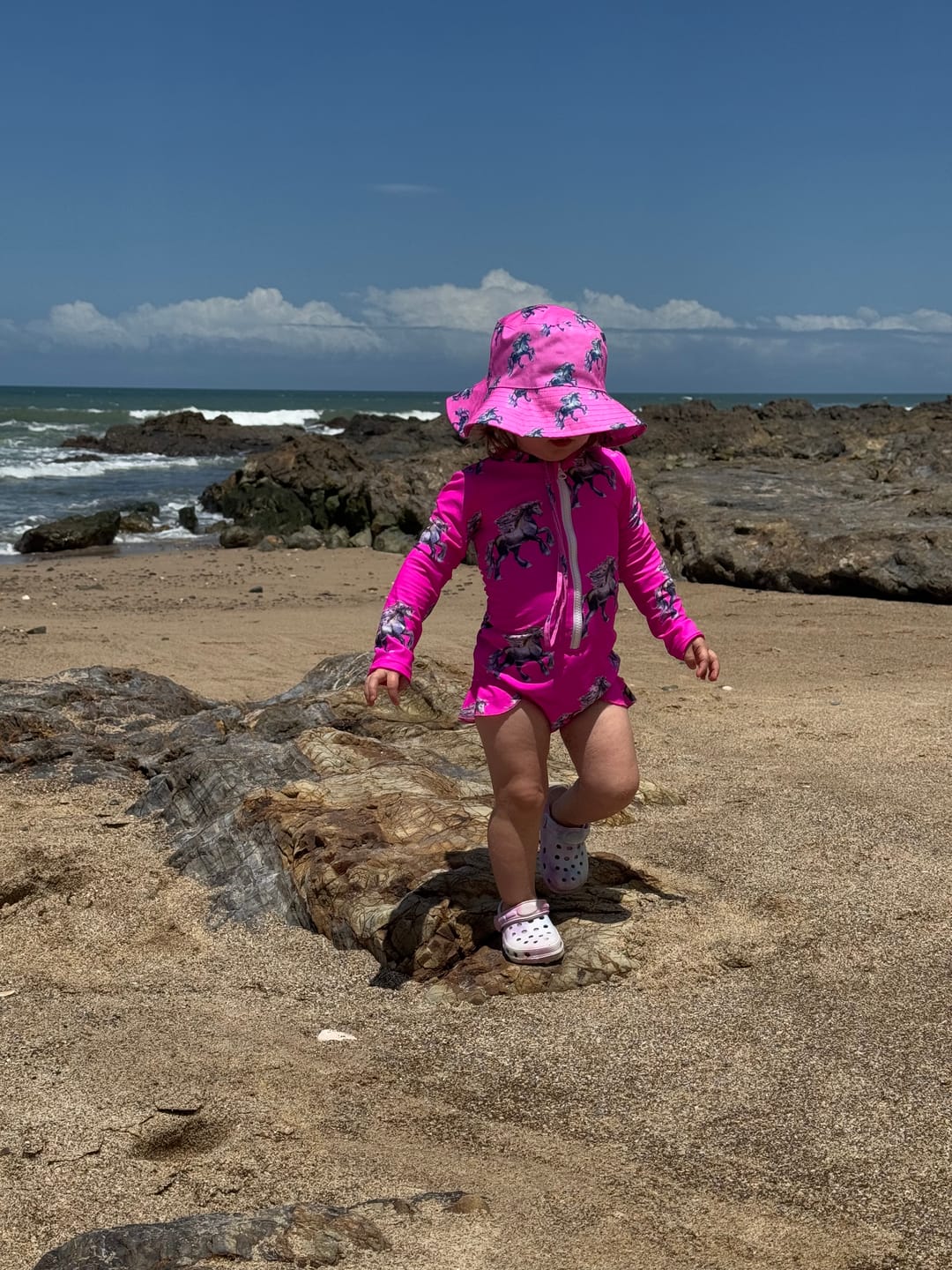 Customer photo review of Fluro Horses Girls Long Sleeve Zip Swimmers
