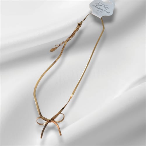 Customer photo review of Collar con moño dorado - acero inoxidable