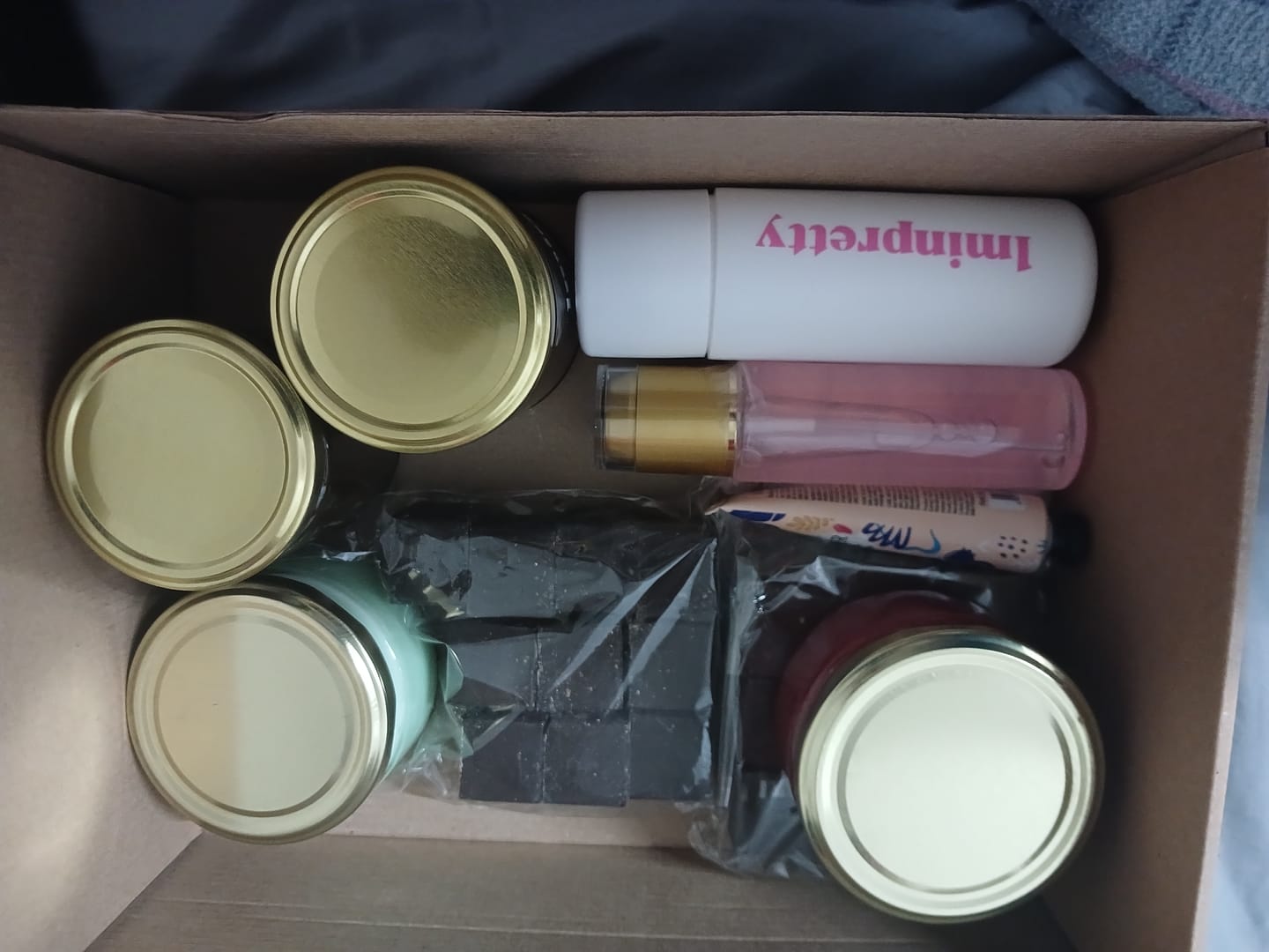 Customer photo review of Kit 1minpretty: 2 tarros de cera + fundidor + refill + extras + talco para depilar con envío gratis mx