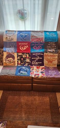 T-shirt quilt with healthcare, superheroes themes by Linda from IA